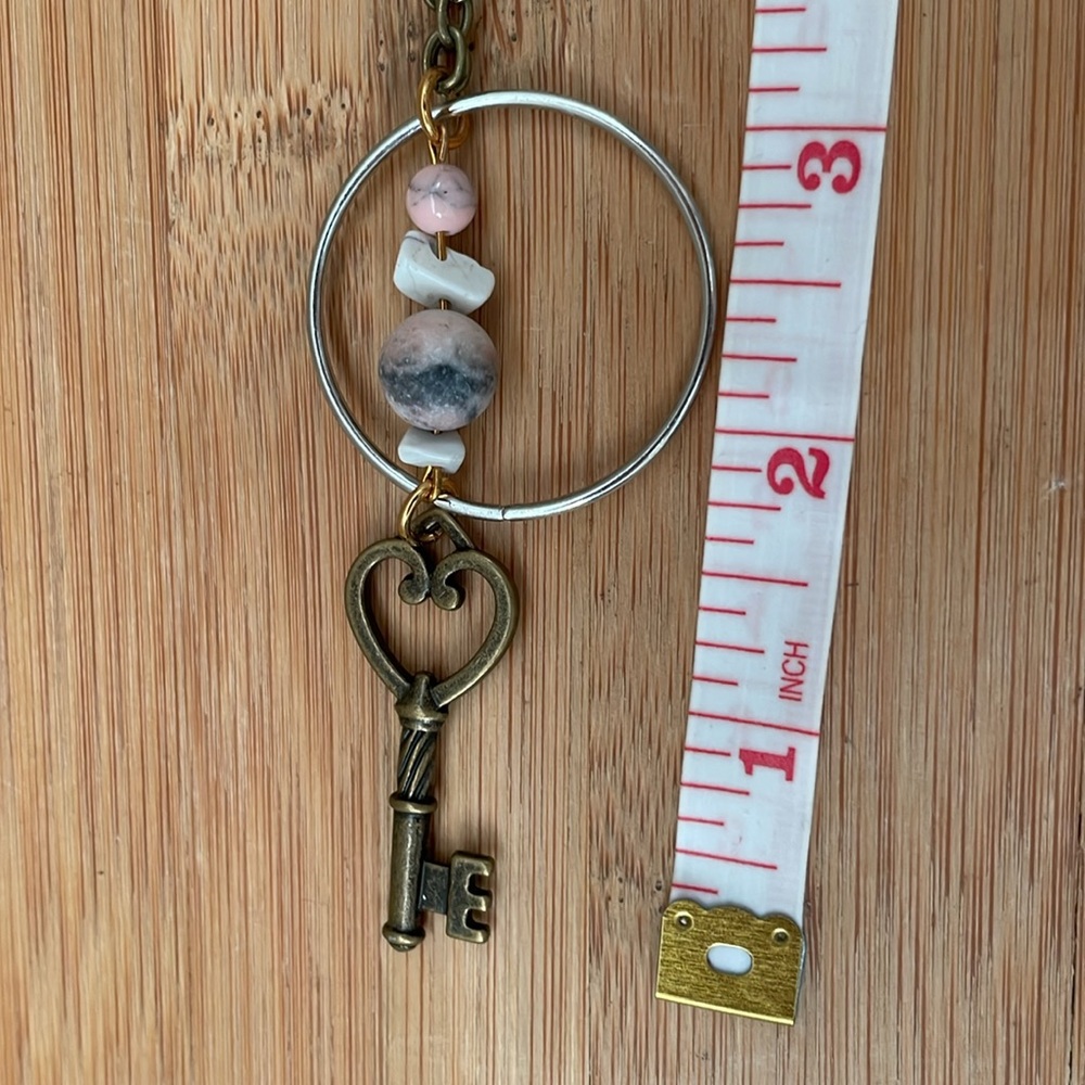 Mixed metal gemstone hoop key necklace